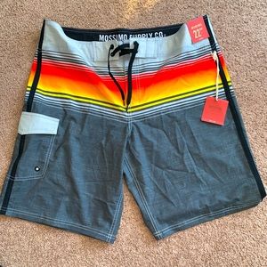 Missimo Supply Co. Light Orange Swim Trunks 22” below knee, size 38.